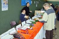 Jochen Vollert on a stand with books from his publishing company Tankograd, photo from Network54.com
