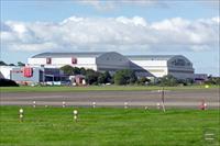 “BAe Systems aircraft hangars at their Filton factory - a third hangar is hidden behind these two”, photo by Arpingstone