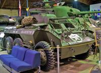 M8 armoured car and M4A3 Sherman tank in the museum building