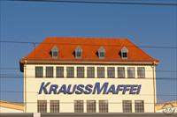 “Kraus-Maffei seen from the S-Bahn station Munich-Allach”, photo from Panoramafotos.net