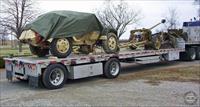 SdKfz 223 and anti-tank guns loaded ready for transport