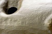 Markings stamped into mantlet